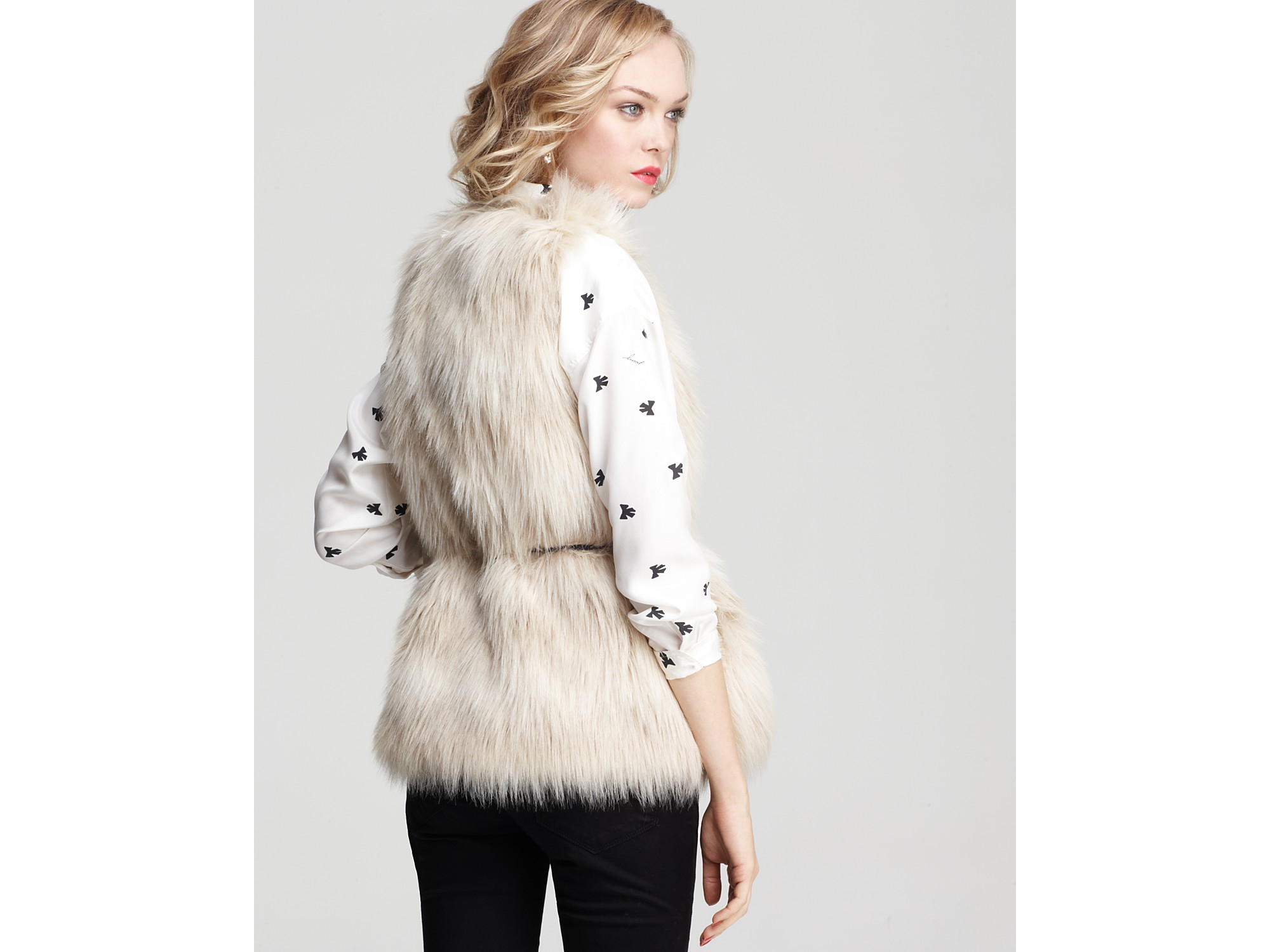 white faux fur vest outfit