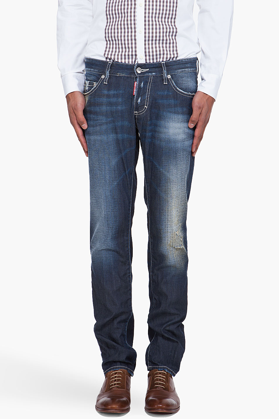 dark blue jeans with white stitching