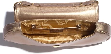 Stuart Weitzman Blitz Clutch in Gold (beige supple kid) | Lyst