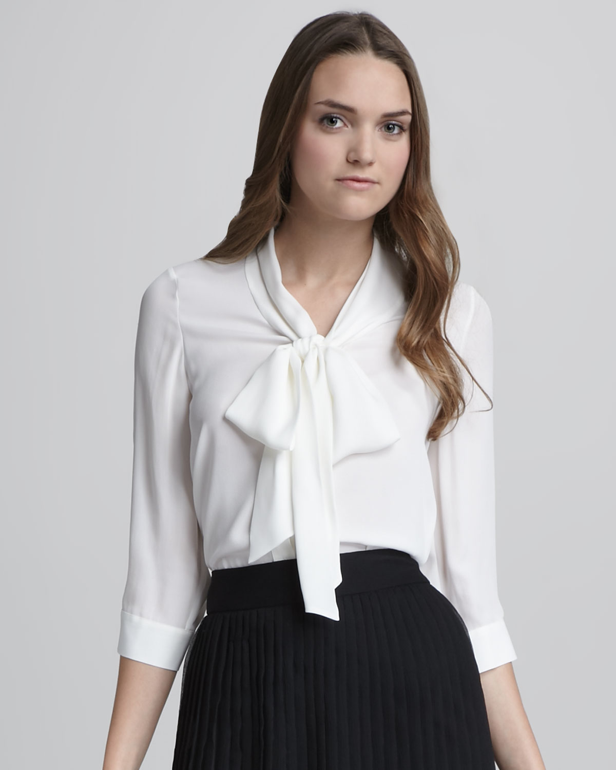 white blouse with tie neck