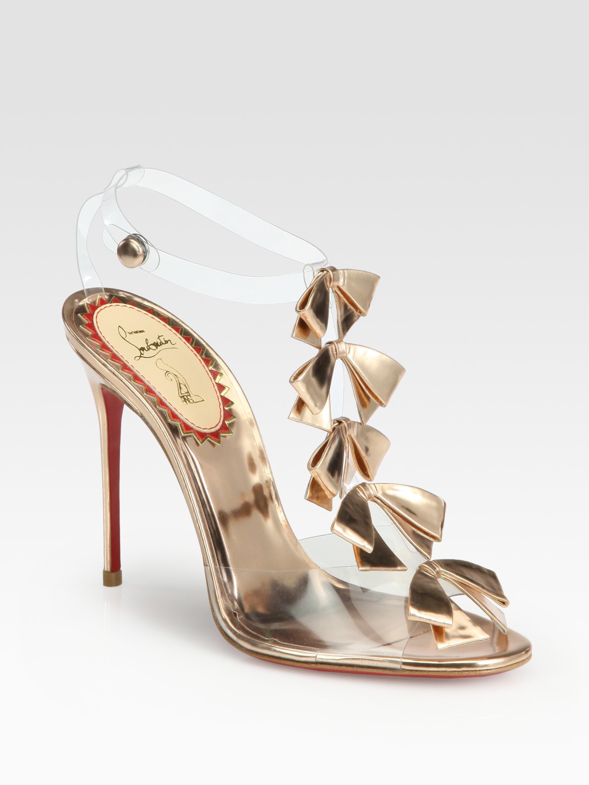 Lyst Christian Louboutin Translucent Bow Bow Metallic Leather Sandals In Metallic 0093