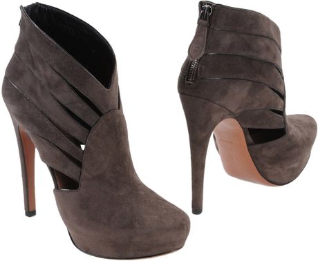 Alaïa Ankle Boots in Brown (lead) | Lyst