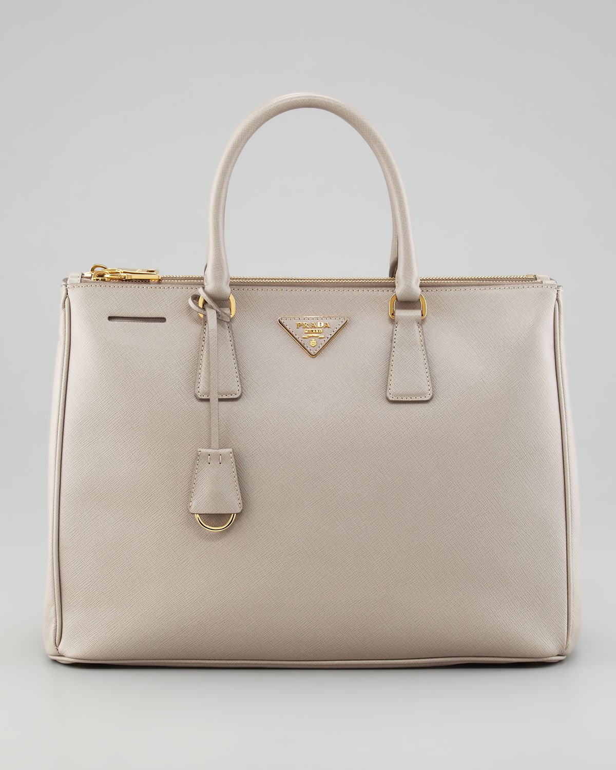 beige prada bag  