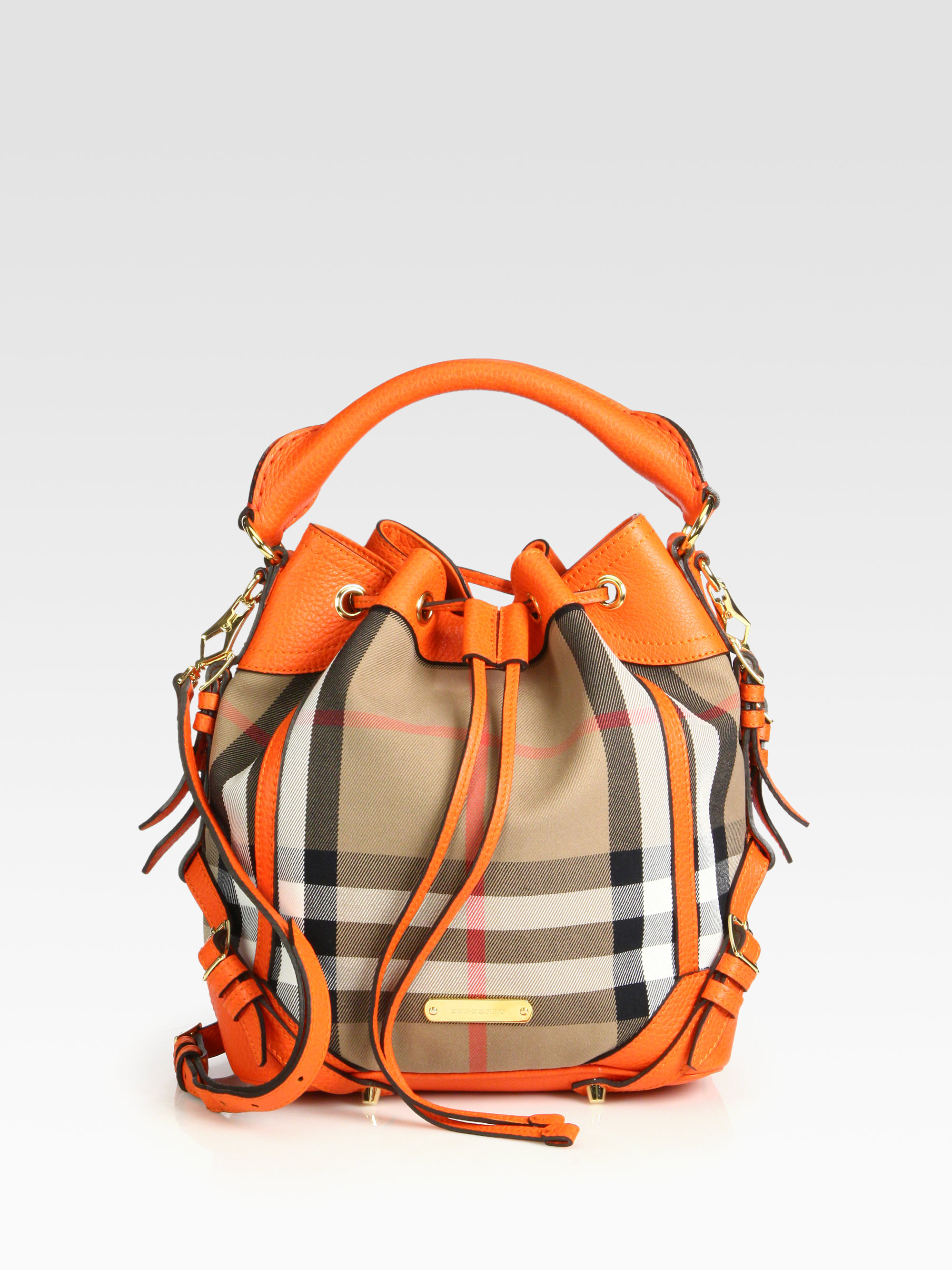 Lyst Burberry Penbury Small Mixedmedia Bucket Bag In Orange Gallery
