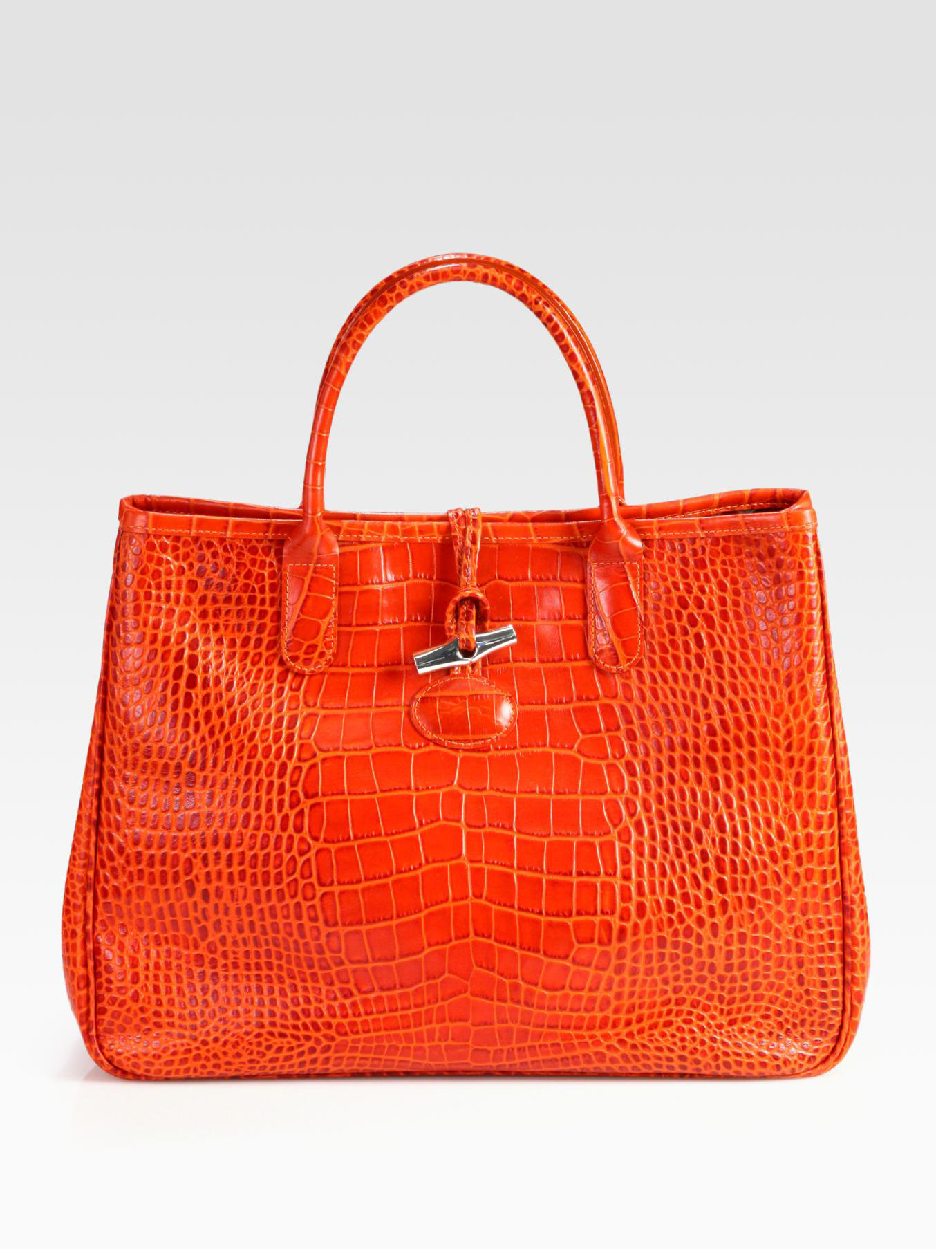 orange crocodile bag