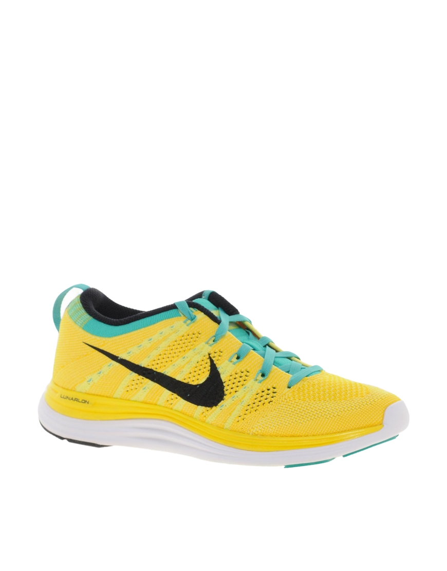 Lyst - Nike Electric Yellow Blue Flyknit Performance Trainer in Yellow