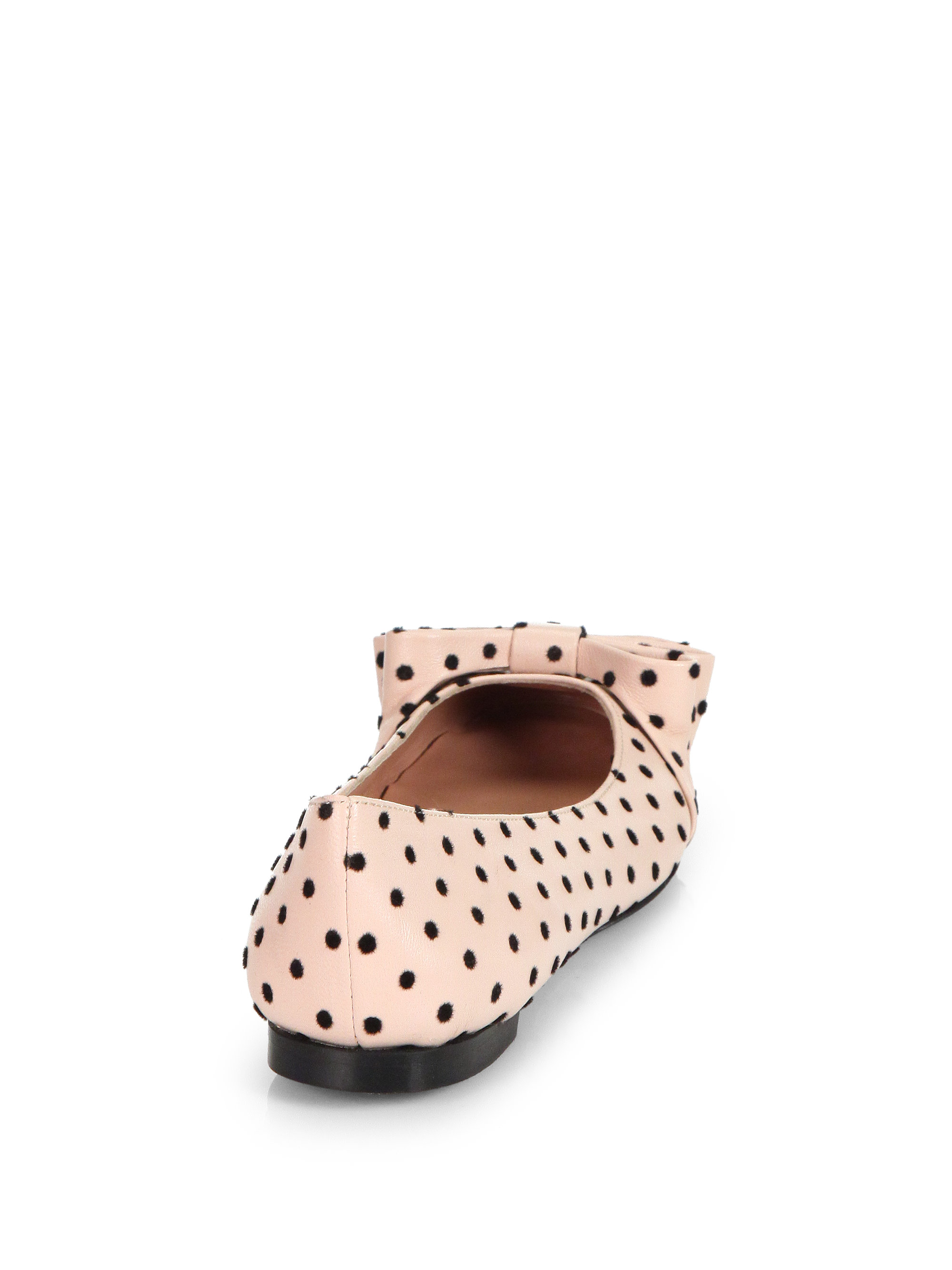 red polka dot flats