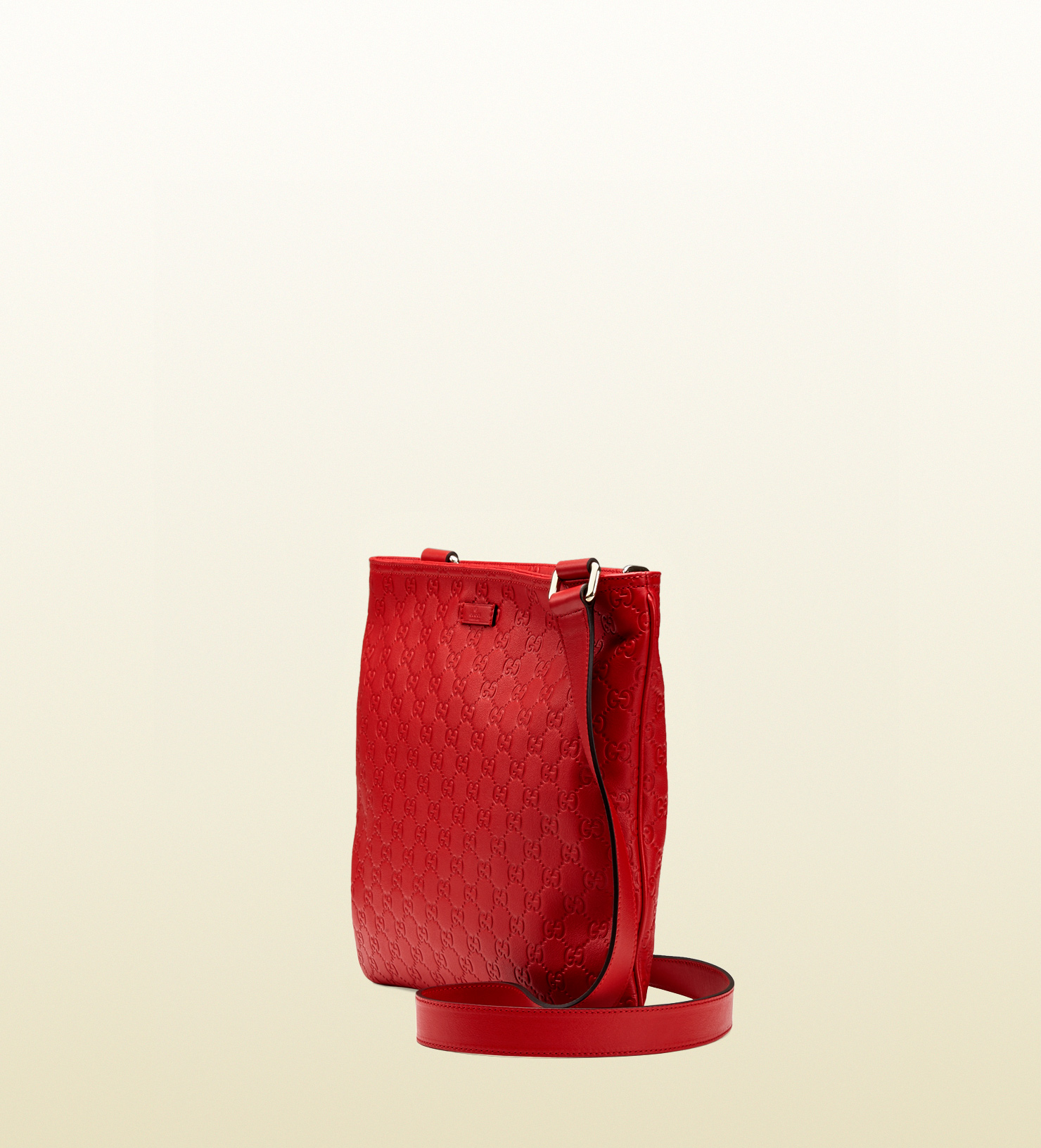 red gucci man bag