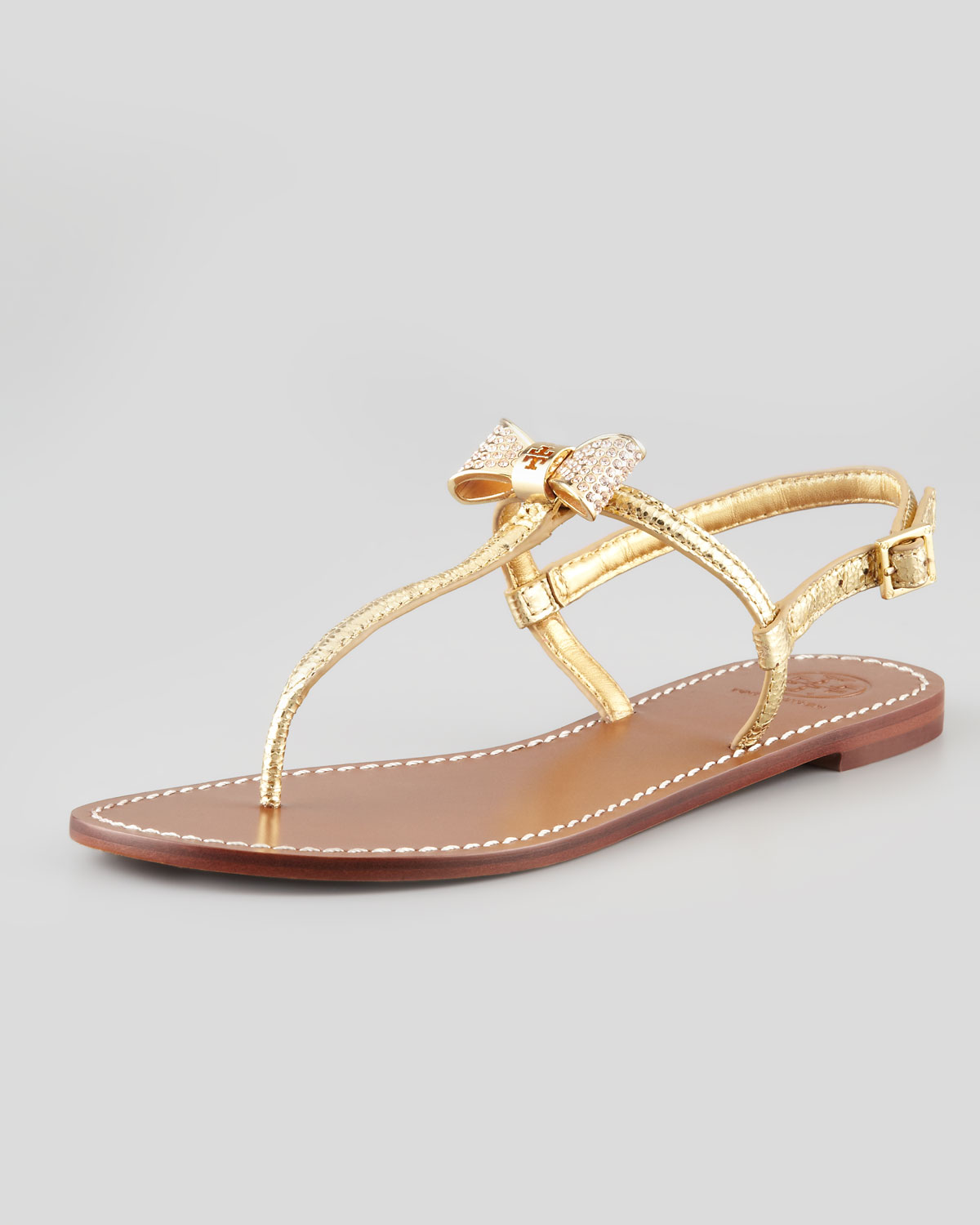 Tory Burch Bryn Pavebow Thong Sandal Gold in Gold | Lyst