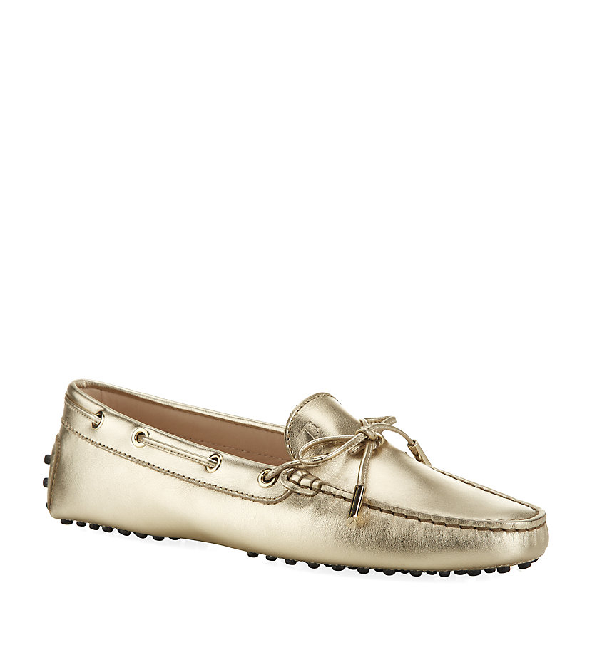 Tod's Laced Gommino Driving Shoe in Gold | Lyst