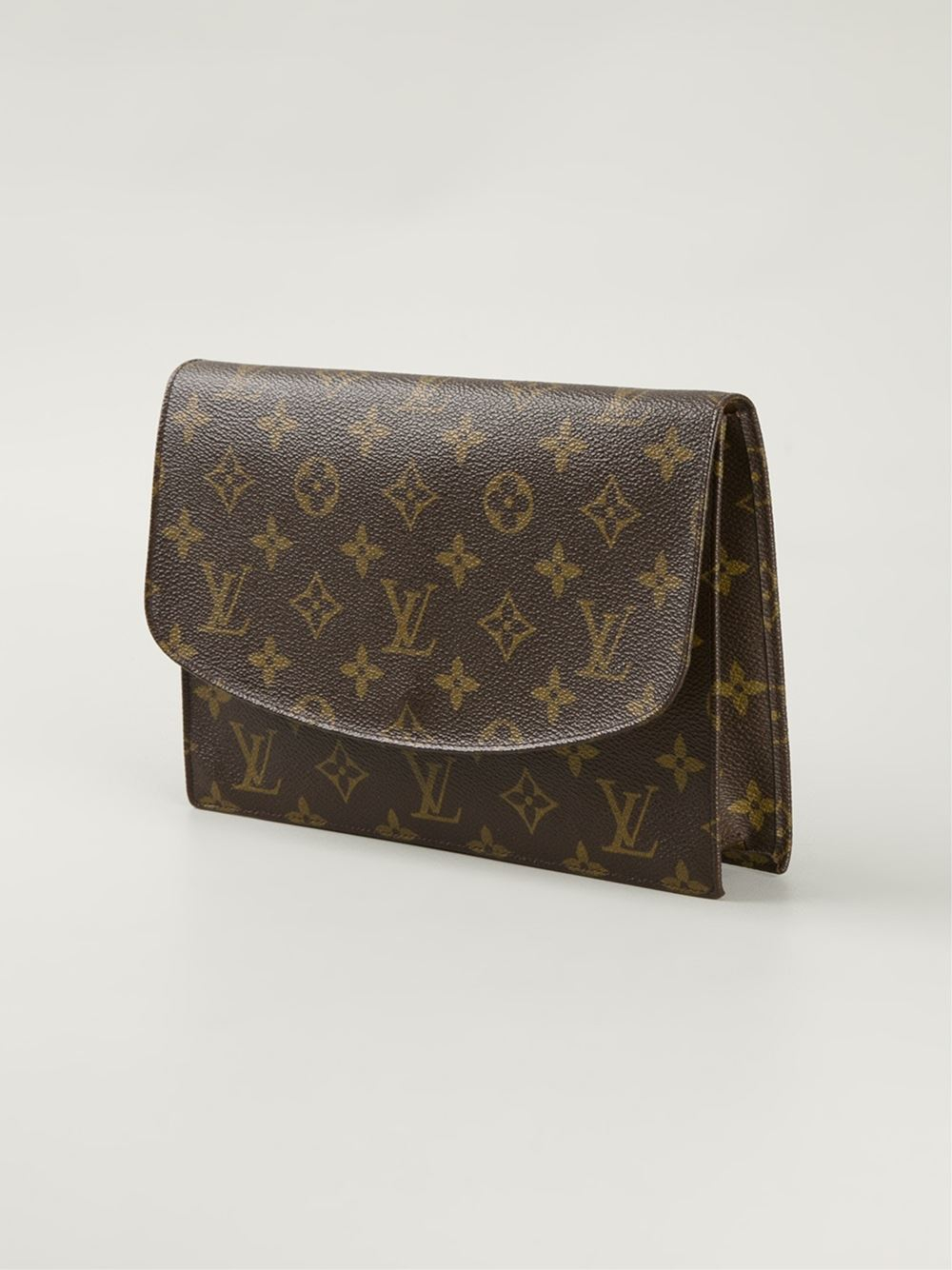 Lyst - Louis Vuitton Monogram Clutch in Brown