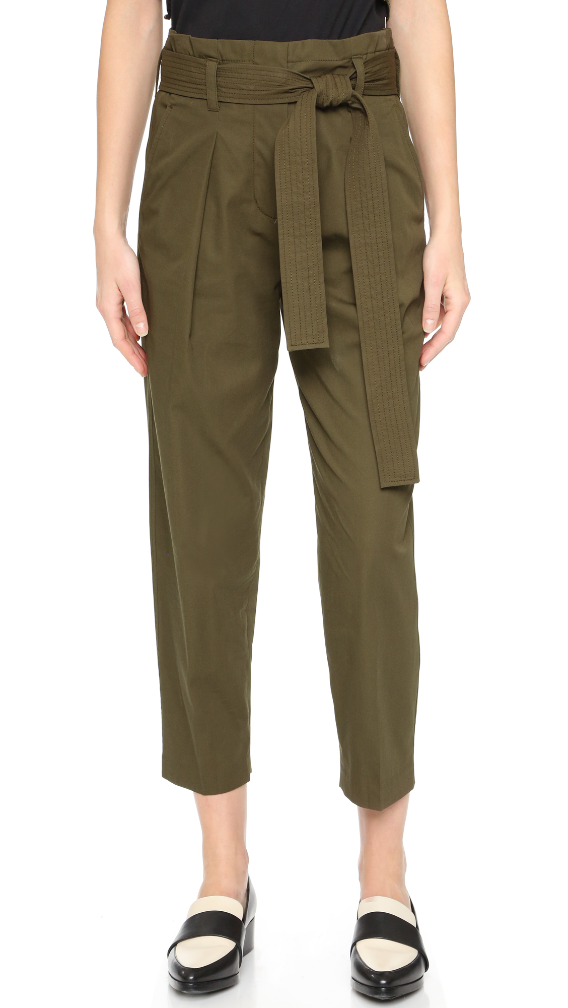 green paper bag trousers