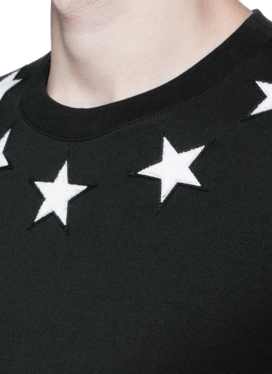 t shirt with stars around the collar