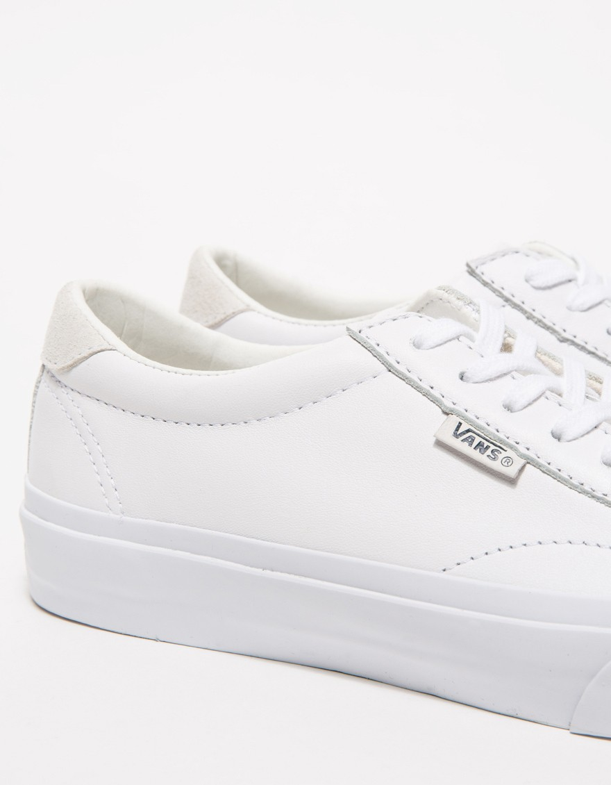 white leather vans        
        <figure class=