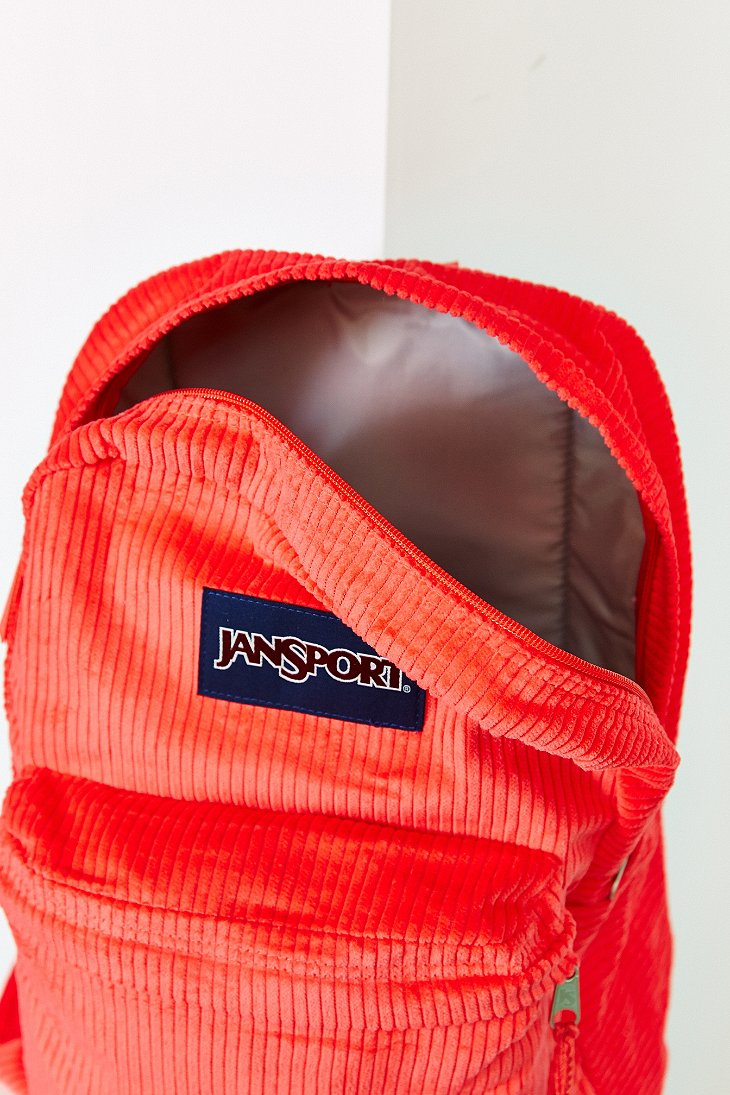 red corduroy backpack