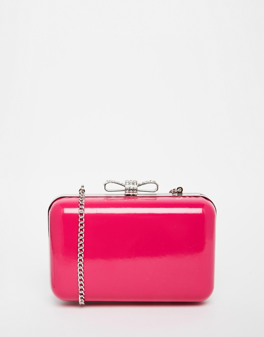Lyst Lipsy Clutch In Neon Pink With Gold Bow Fastening Gallery
