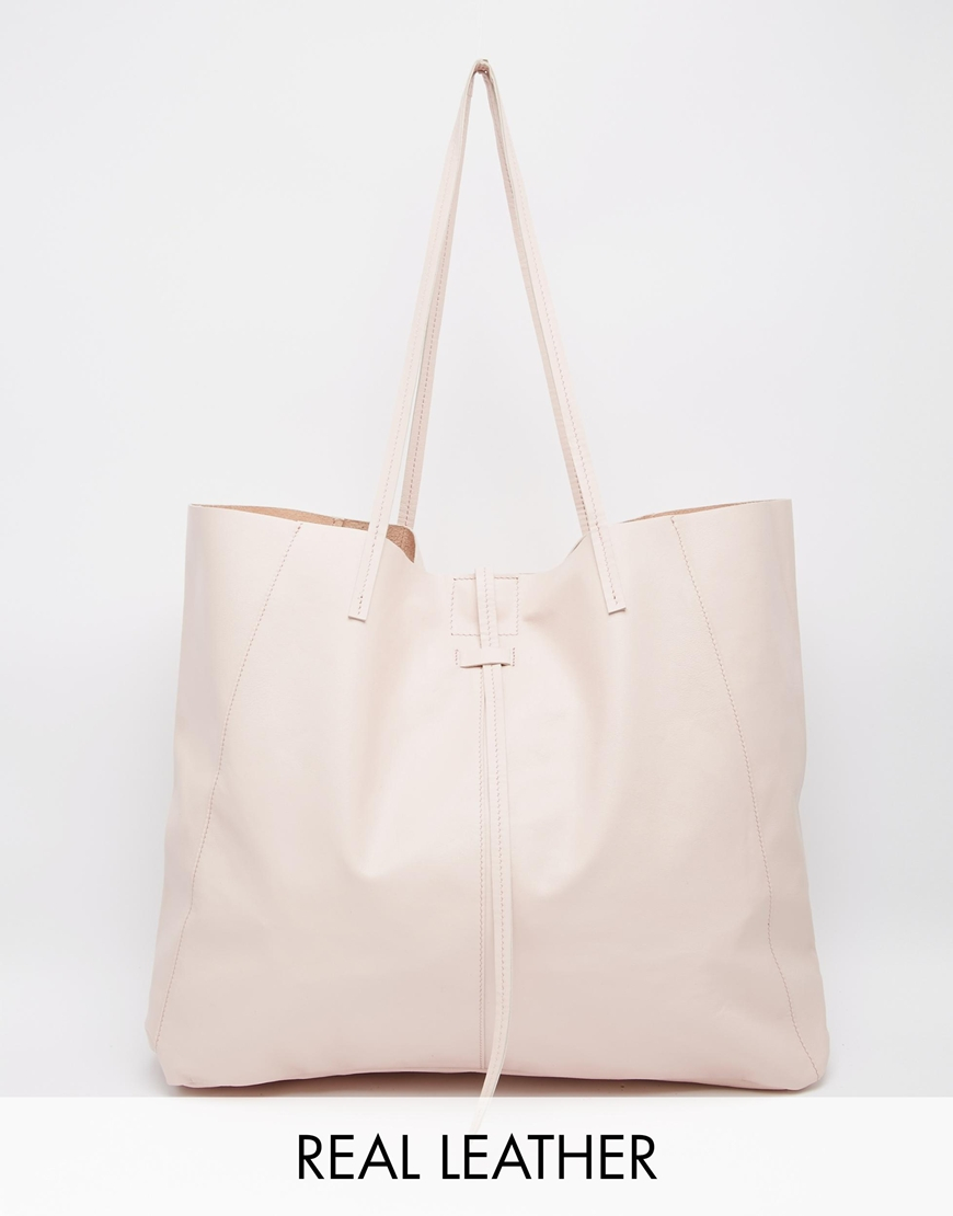 Lyst Asos Unlined Leather Per Bag With Tie Detail In Natural Gallery