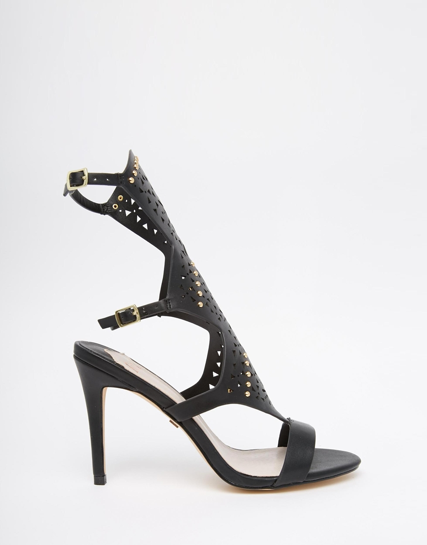 25 Wear-to-Work Spring Skirts V by Very High Leg Gladiator Sandal Achieve a flirty fashion look with these fierce gladiator sandals from V by Very. The high leg wraps around the calves, revealing and concealing your pins for .