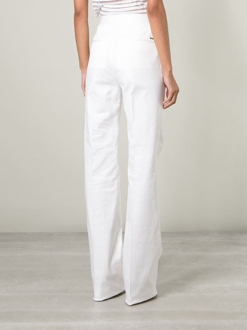 white flared trousers