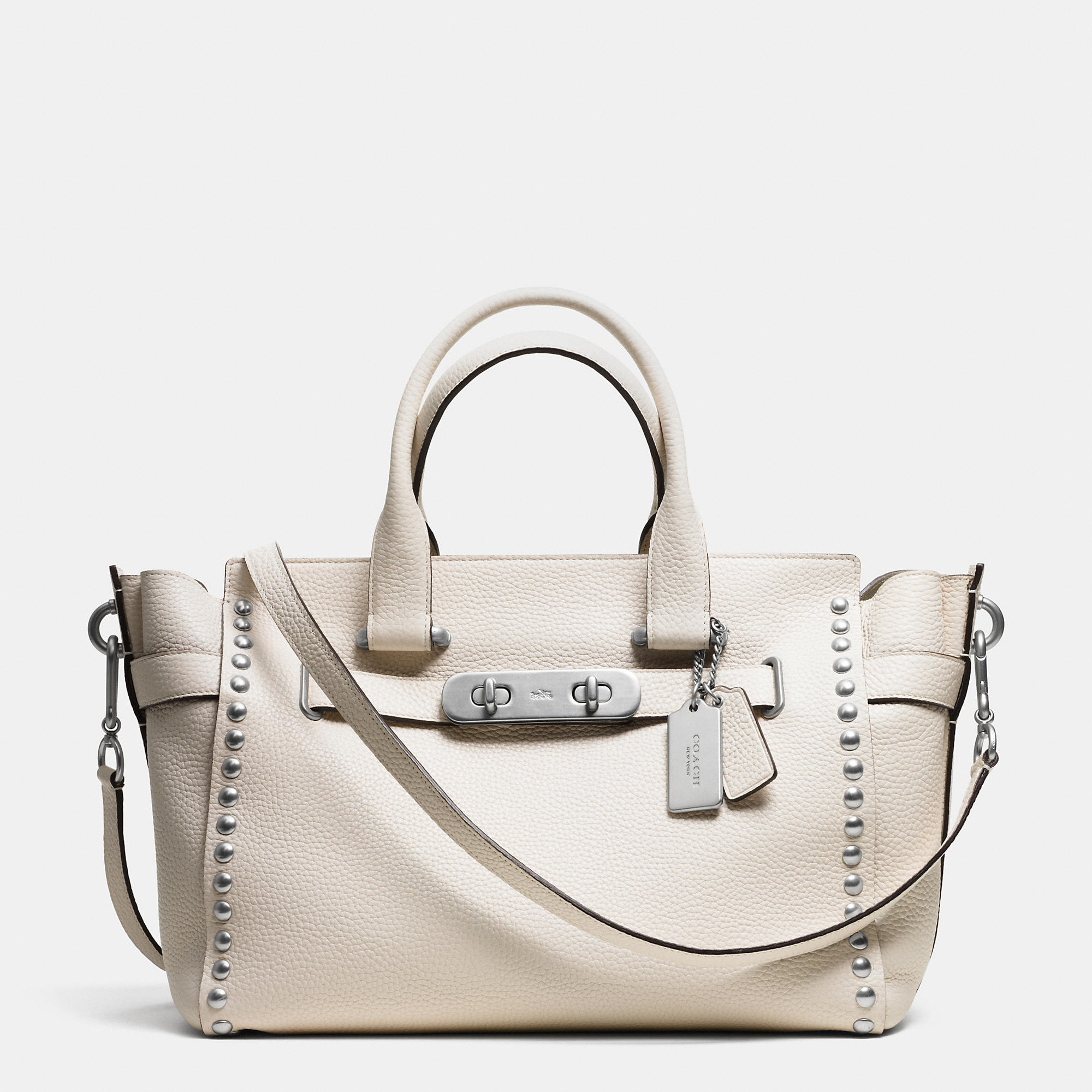 coach swagger in lacquer rivet pebble leather in white lyst coach swagger in lacquer rivet pebble leather in white lyst