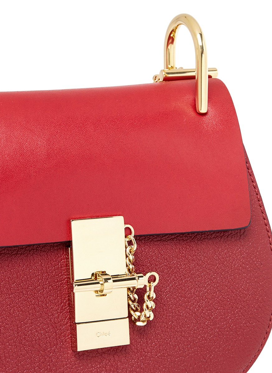 small red leather shoulder bag