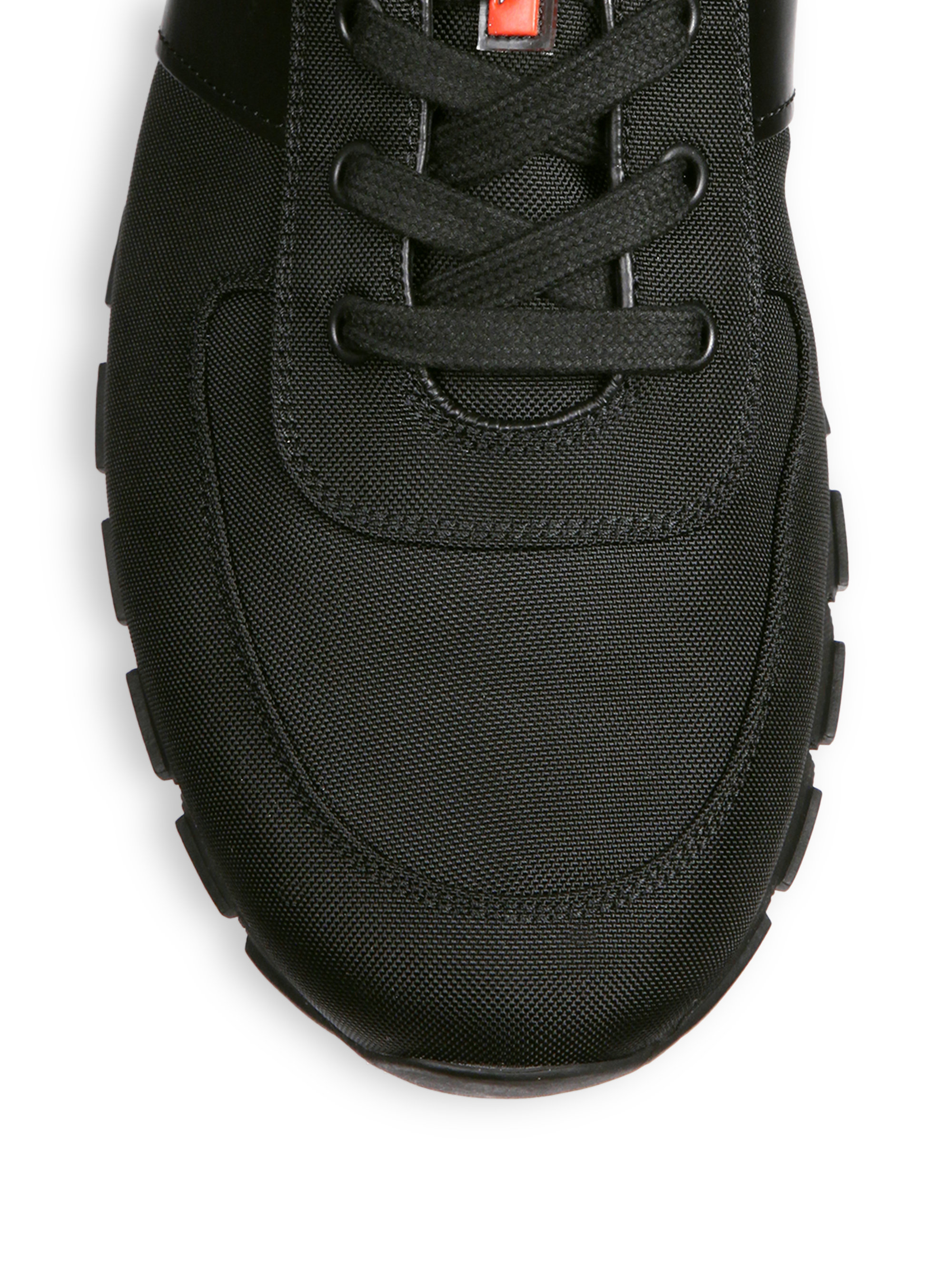 prada triple black runners