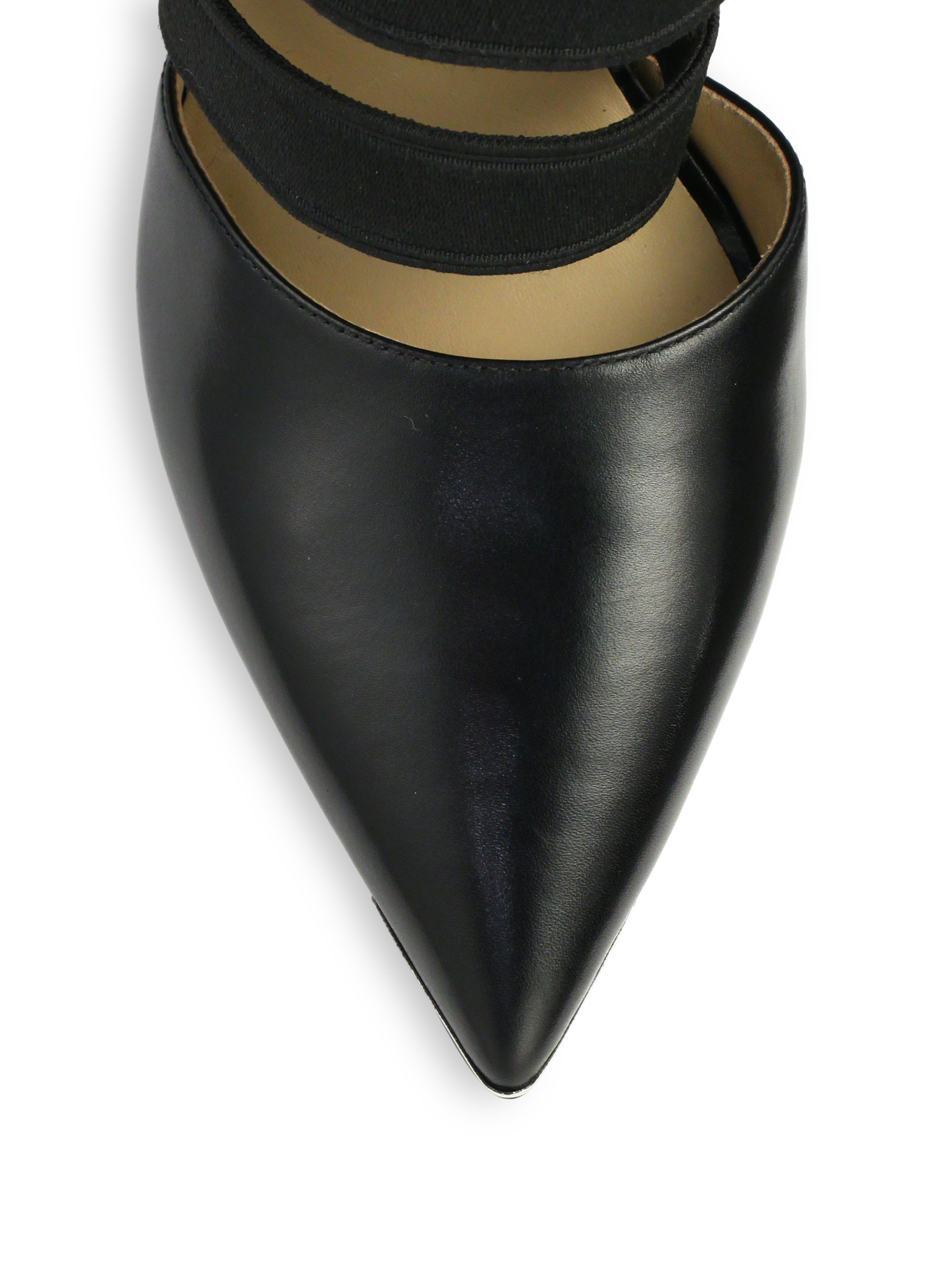 black leather pumps with ankle strap