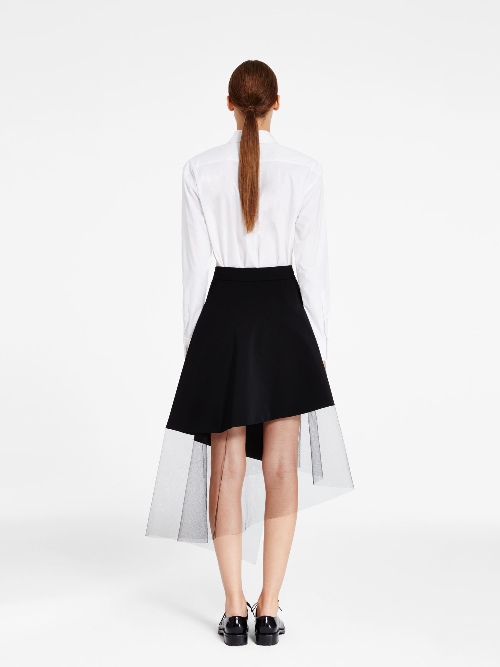 Lyst - Dkny Asymmetrical Mesh Hem Midi Skirt in Black