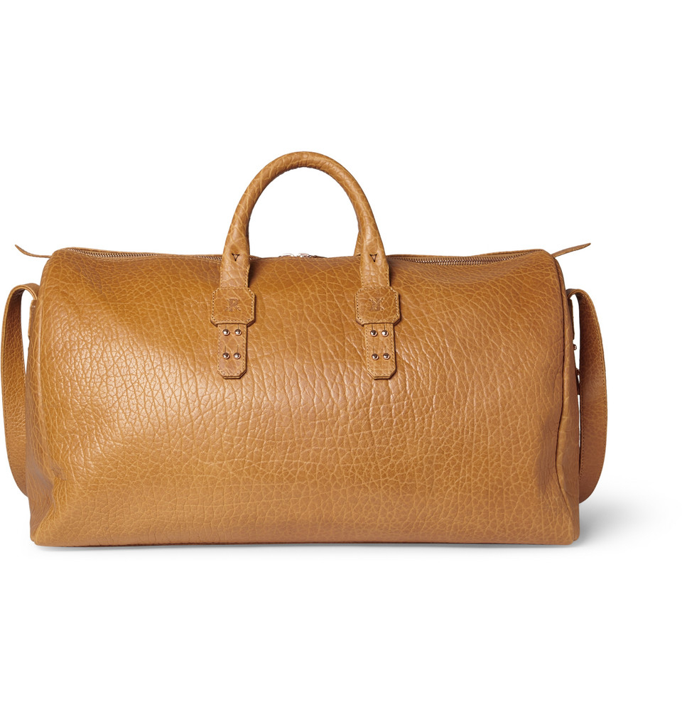 brown leather holdall bag