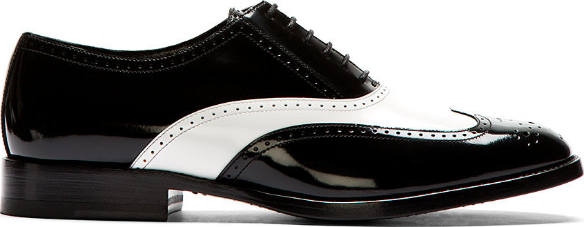 black and white spectator flats