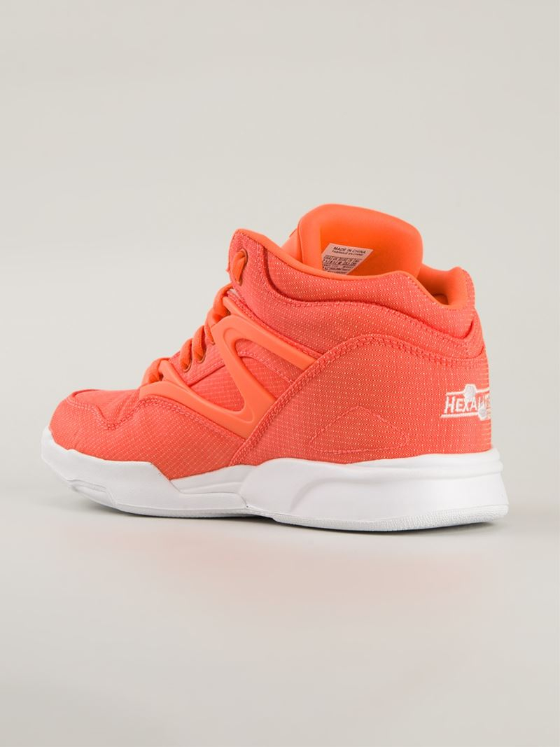 orange reebok high tops