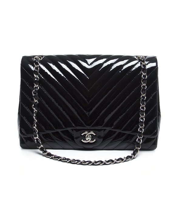 Chanel Pre-Owned Black Patent Leather Chevron Maxi Flap Bag in Black | Lyst
