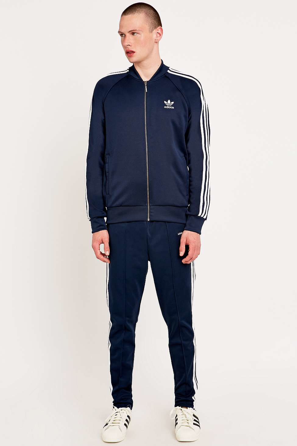navy and white adidas tracksuit