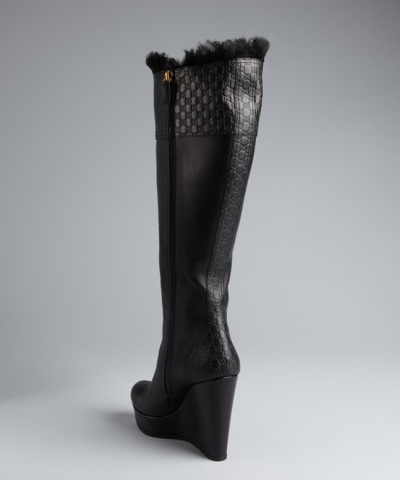 tall black boots with wedge heel