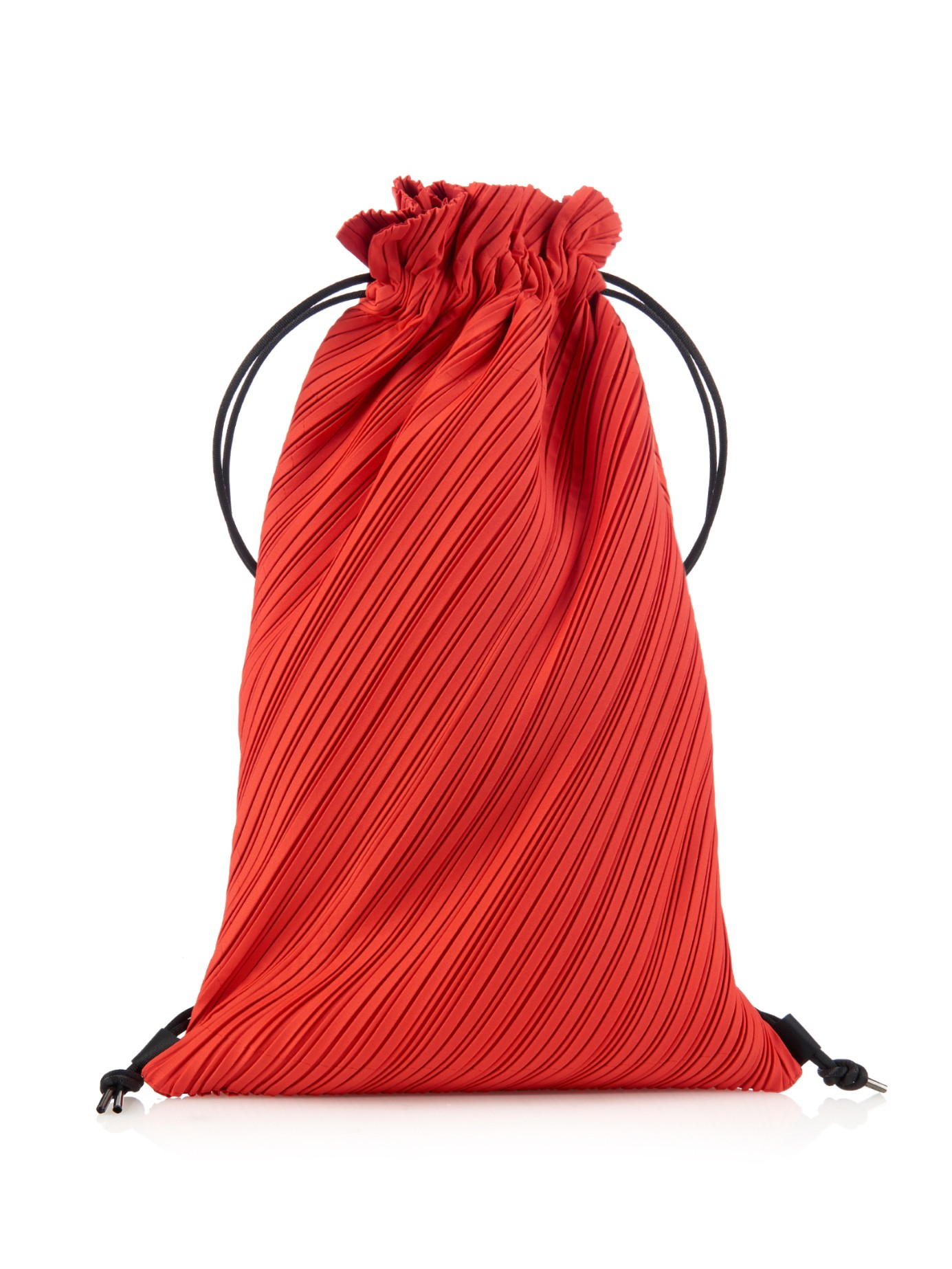 Lyst - Pleats Please Issey Miyake Pleated Drawstring Backpack in Red
