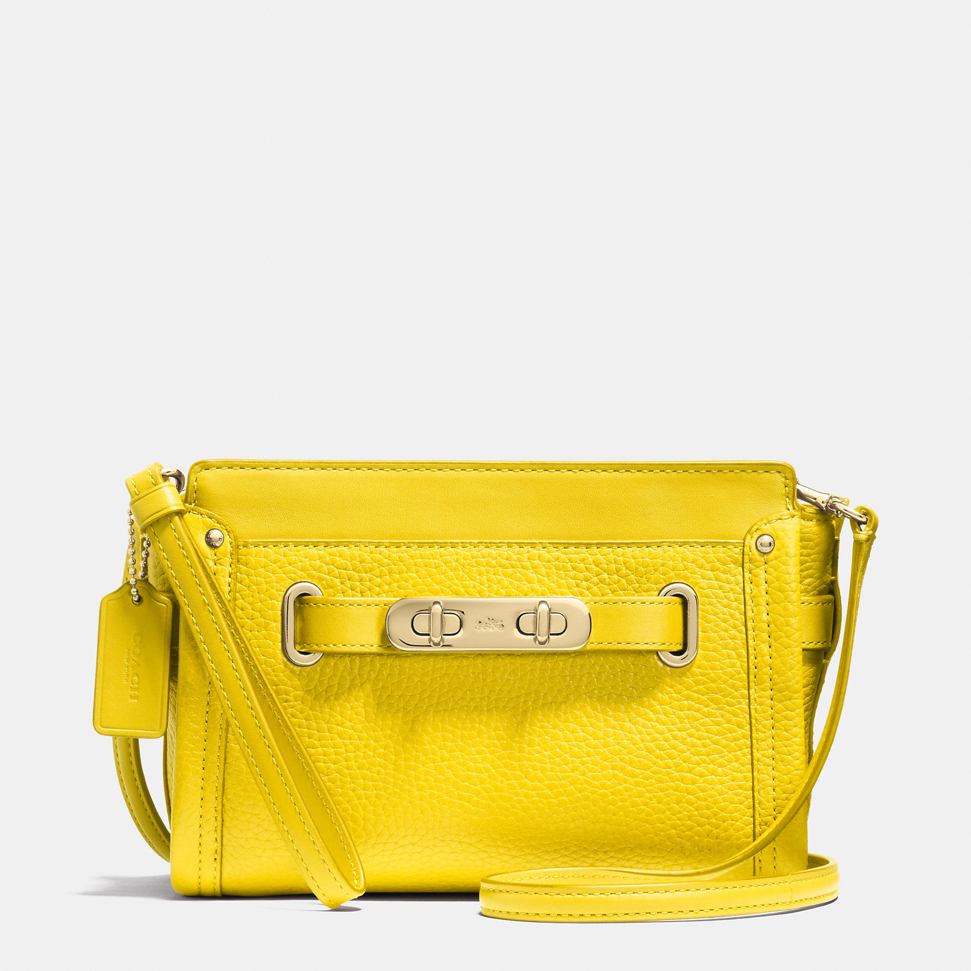 Lyst Coach Swagger Wristlet In Pebble Leather in Yellow