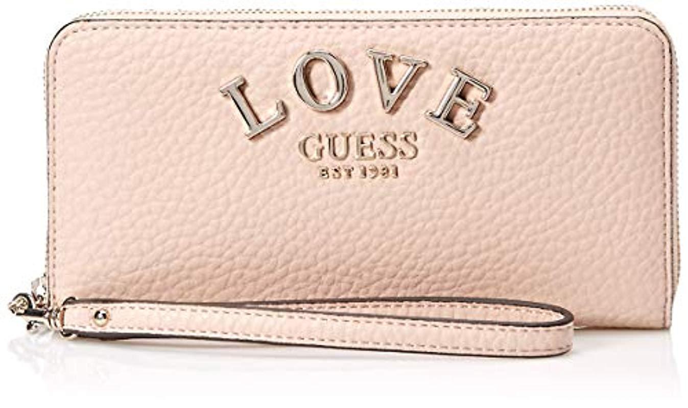 Guess Conner Large Zip Around Wallet in Pink Lyst