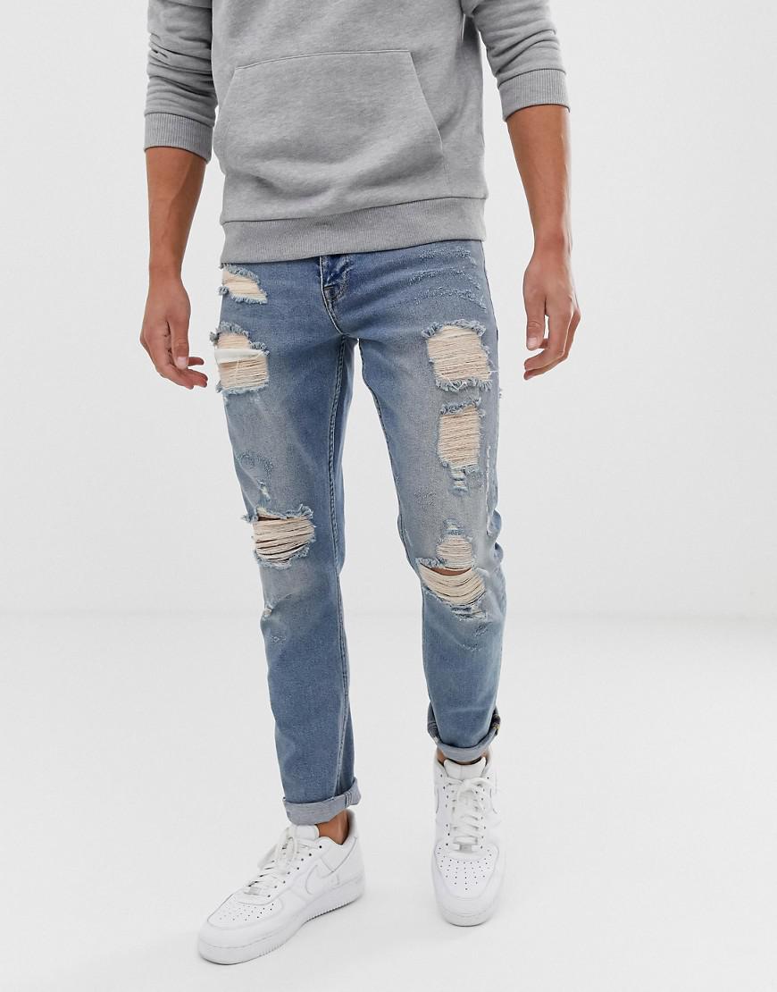 Lyst - Asos Slim Jeans In Vintage Light Wash Blue With Heavy Rips in ...