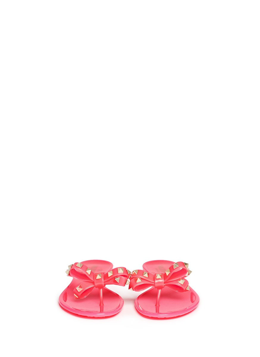 Lyst - Valentino Rockstud Bow Flat Jelly Sandals in Pink