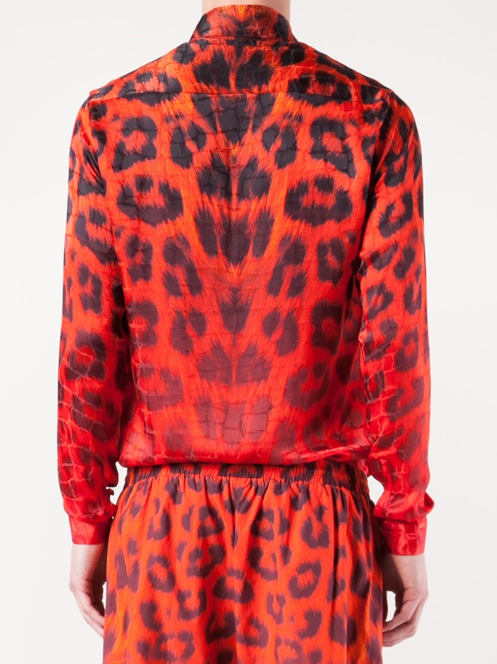 red shirt with leopard sleeves