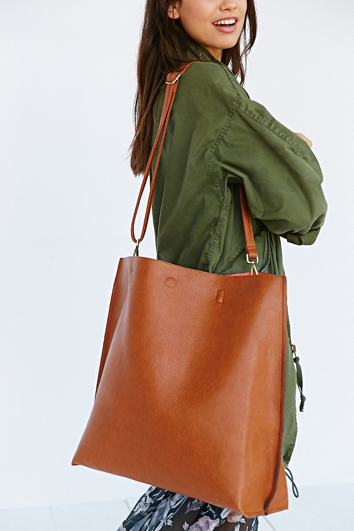 Urban outfitters Oversized Reversible Vegan Leather Tote Bag in Brown | Lyst
