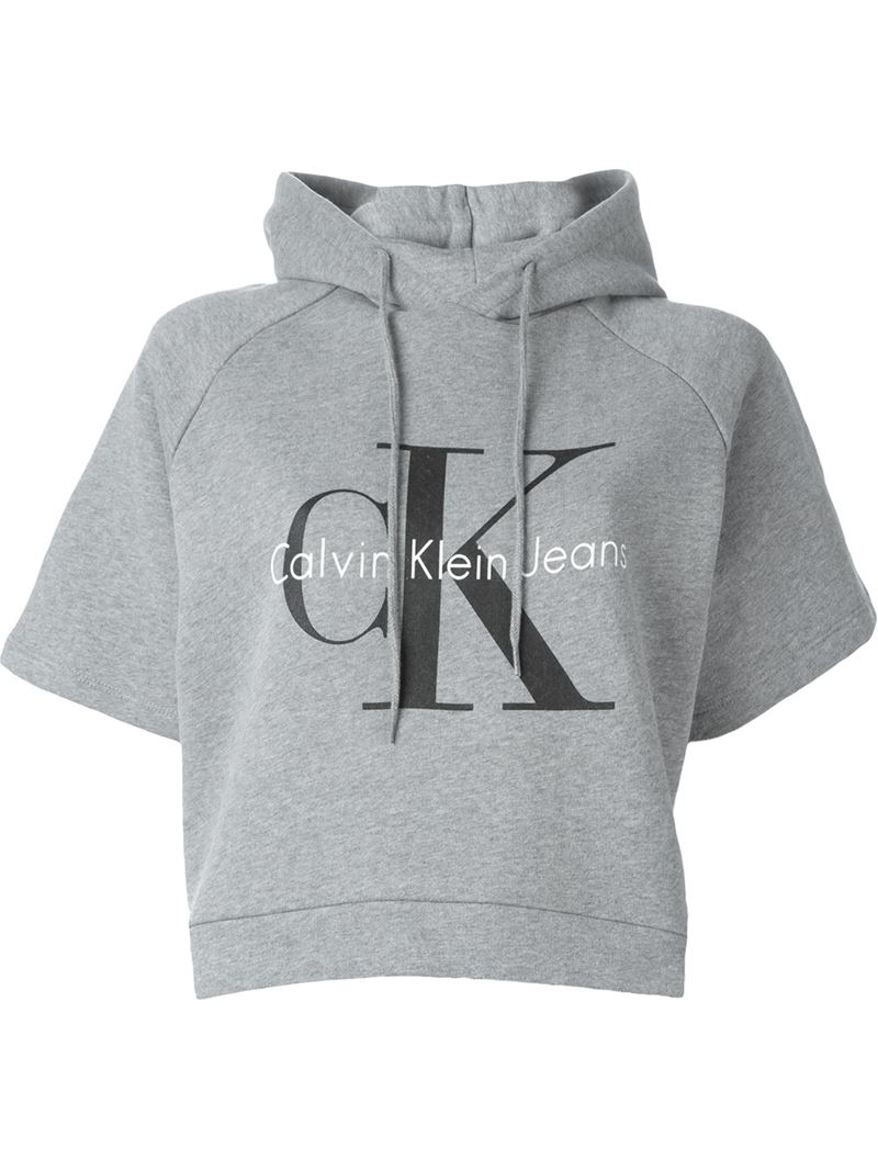 Lyst Calvin Klein iJeansi Logo Print Cropped iHoodiei in Gray