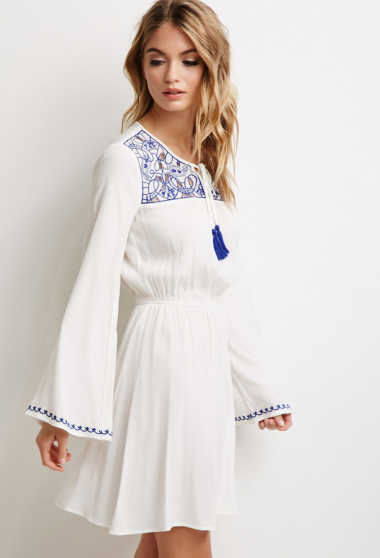 white embroidered peasant dress
