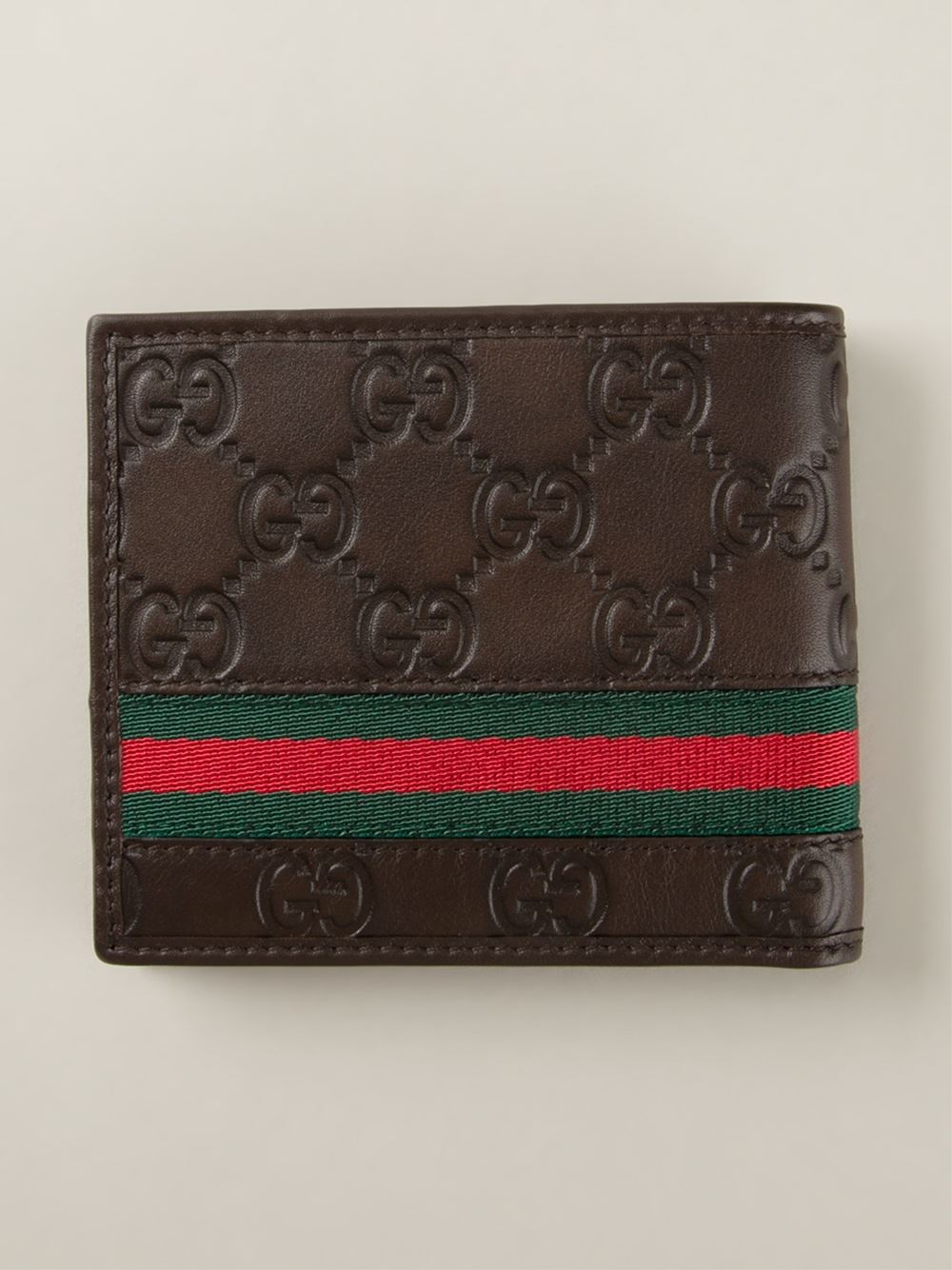 Lyst - Gucci Logo Embossed Wallet in Brown for Men