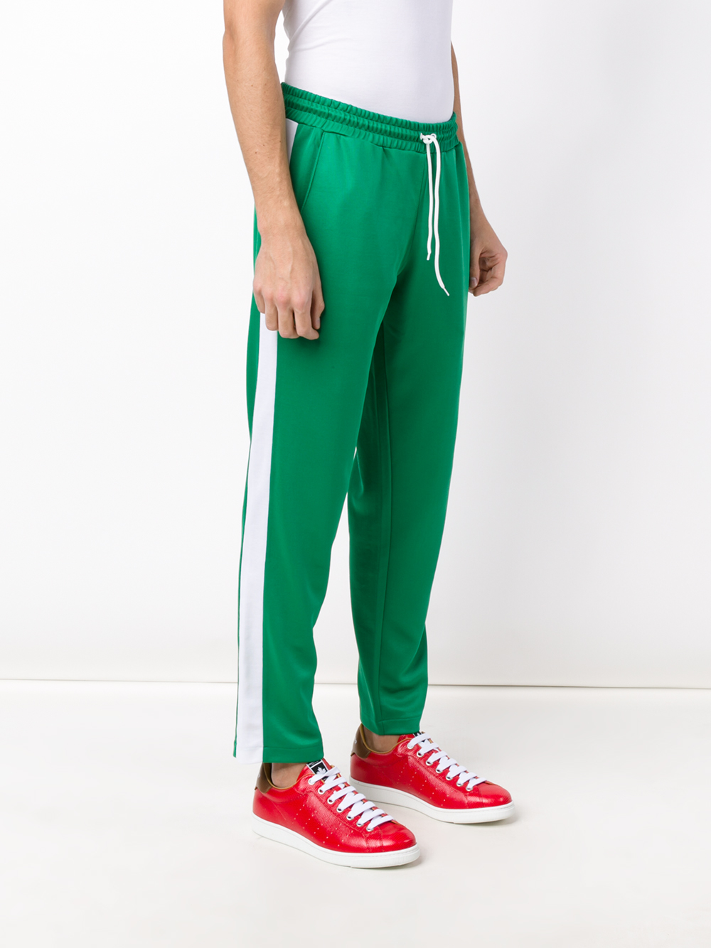 striped track pants with ankled zippers