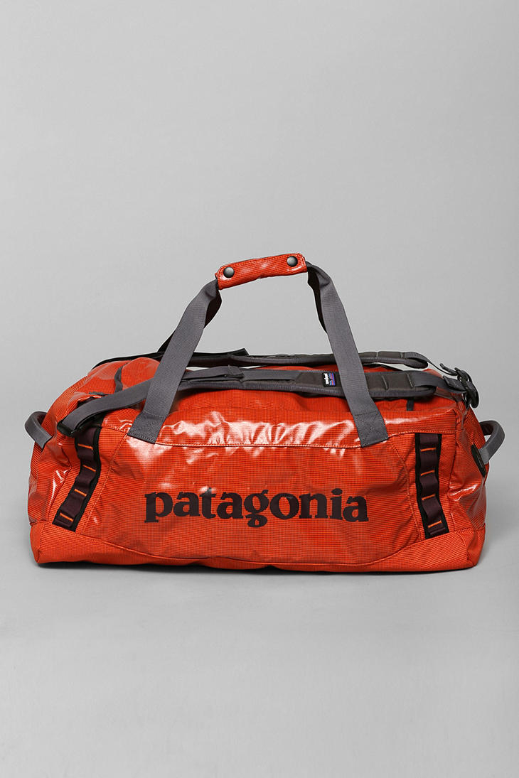 Lyst Patagonia Black Hole Duffle Bag in Orange for Men