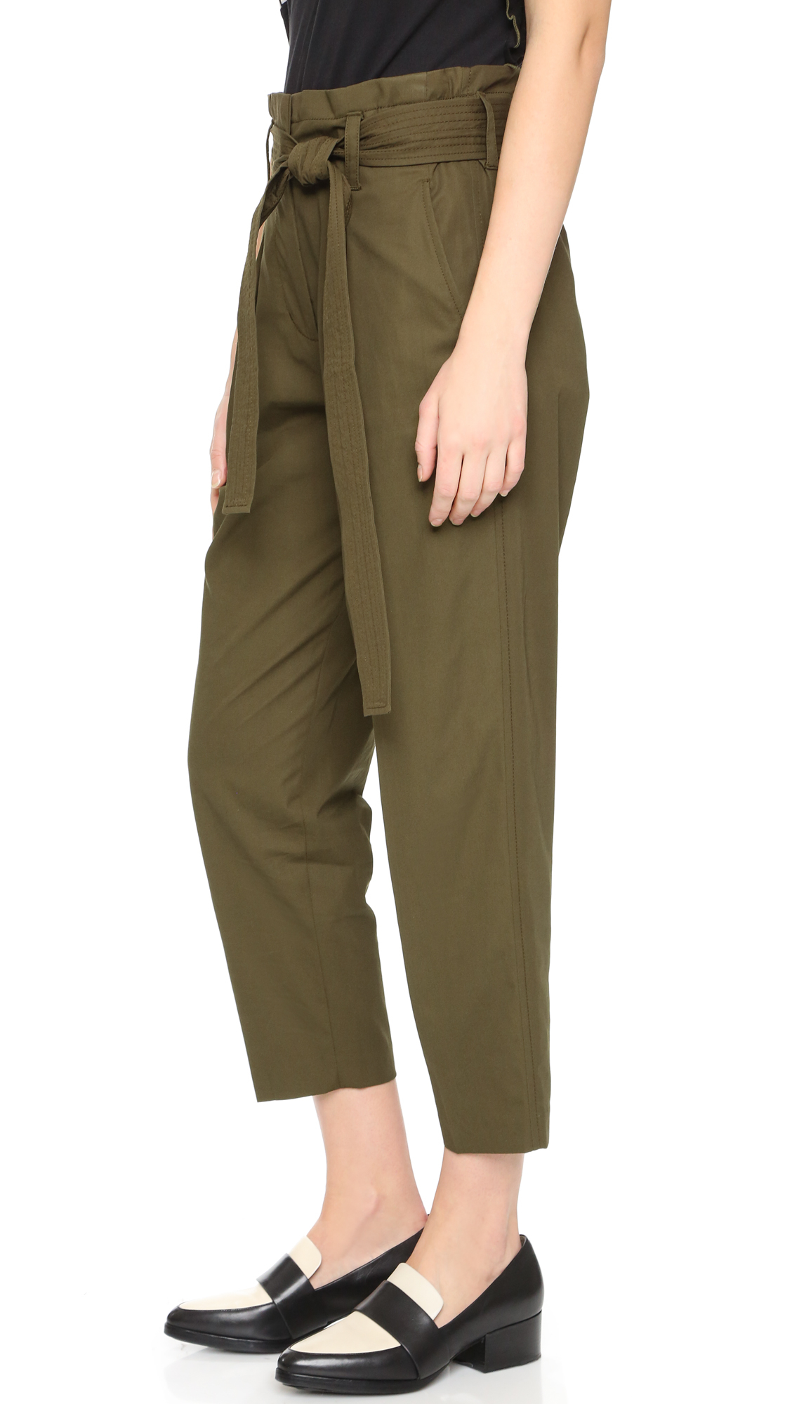 green paper bag trousers