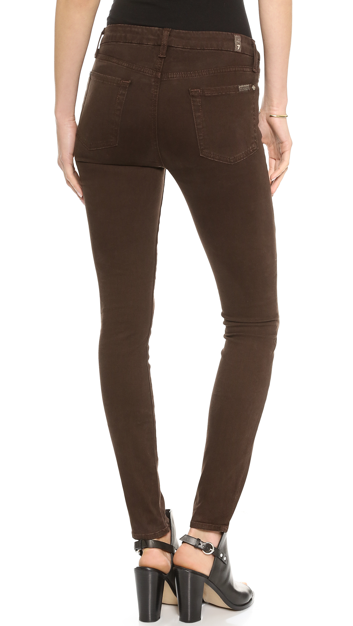 black top and brown pants