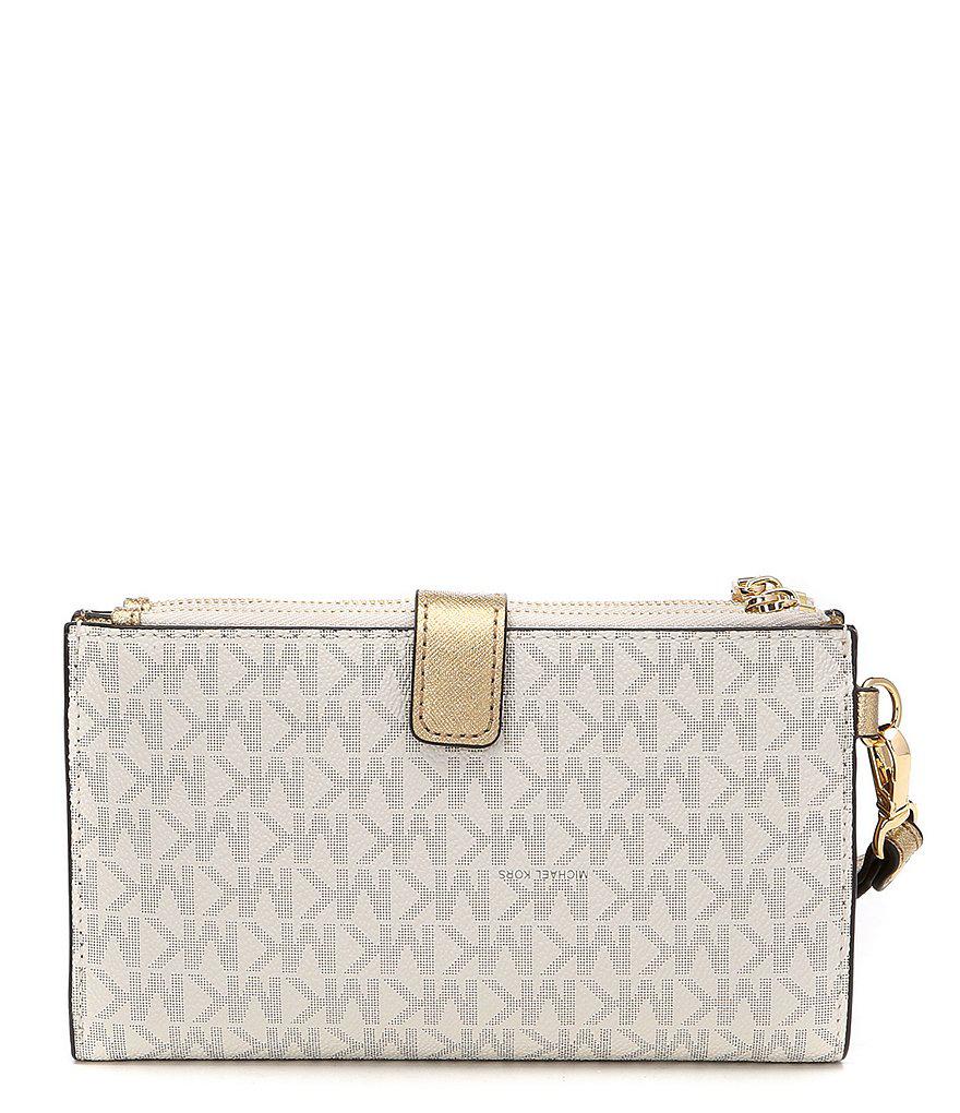 Lyst Michael Kors Signature Double Zip Wristlet In Black Gallery