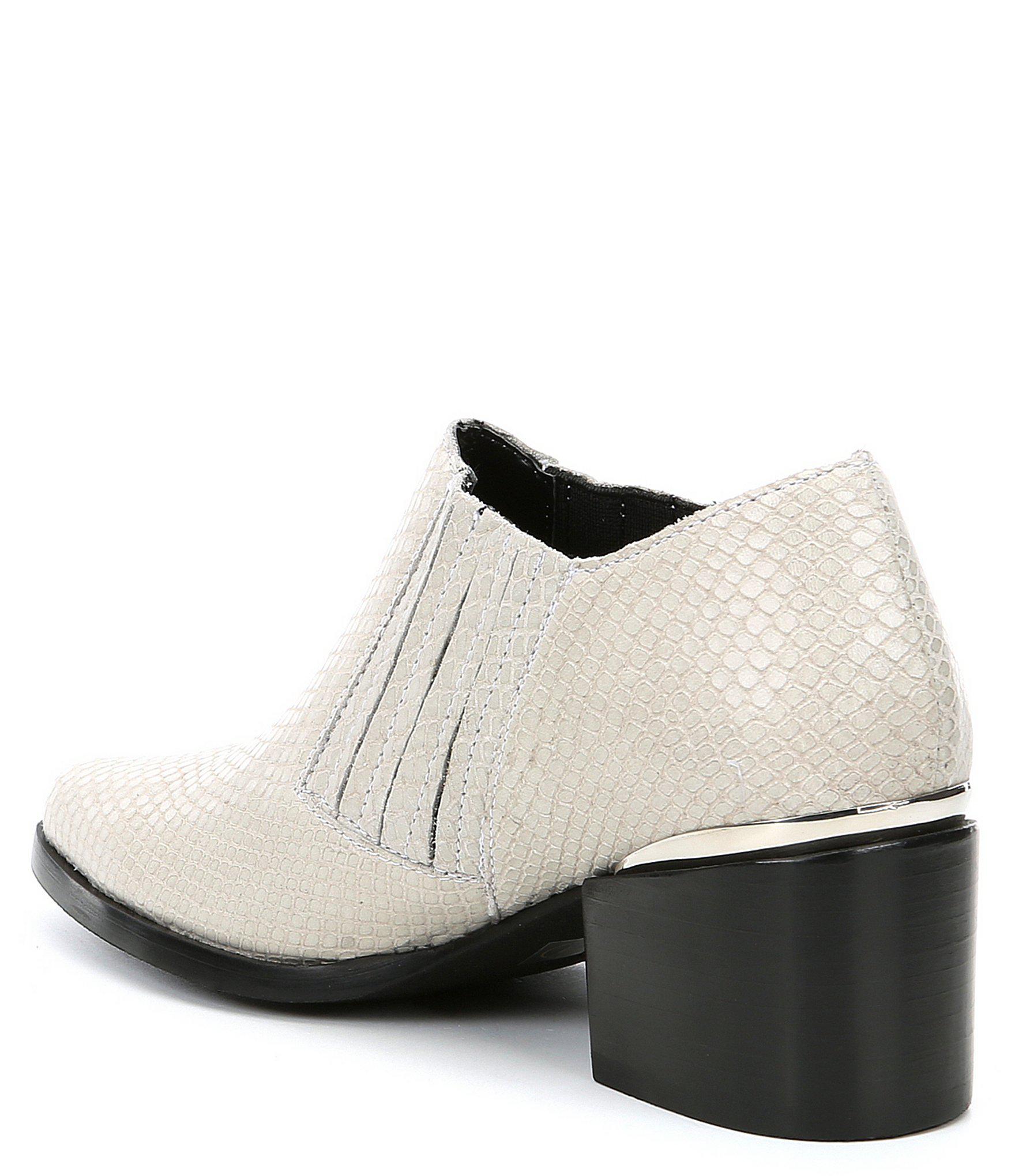 white booties snakeskin heel